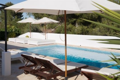 sun loungers and umbrellas at casa carolle ibiza